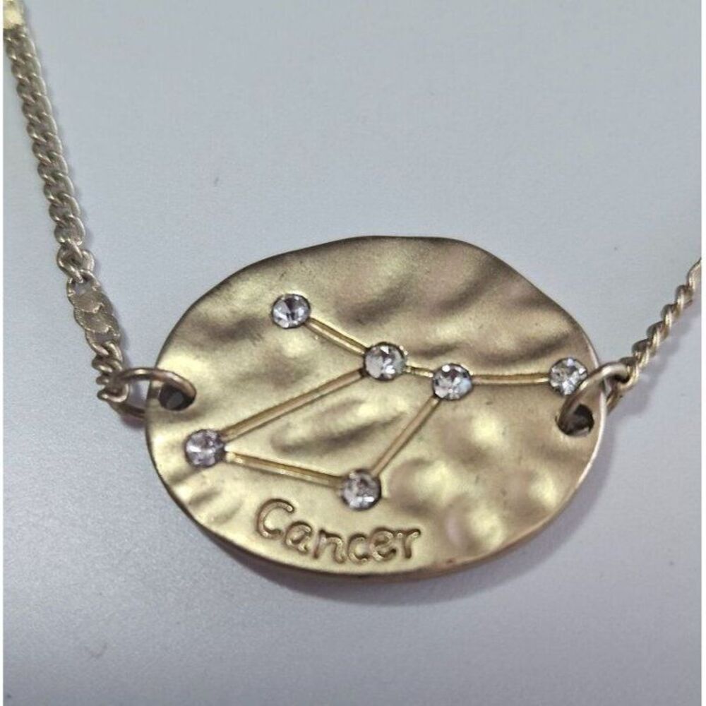 Gold tone cancer zodiac bracelet up to 9"